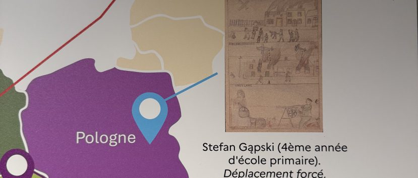 Na mapie zaznaczona Polska. Obok rysunek dziecka